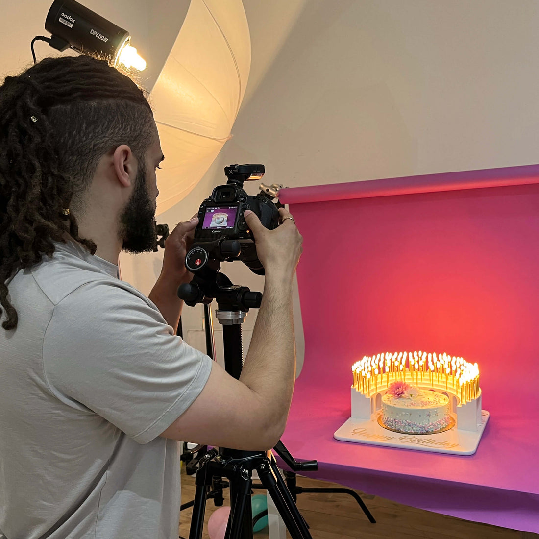 Birthday Grandstand with 100 lit candles, set up photo studio