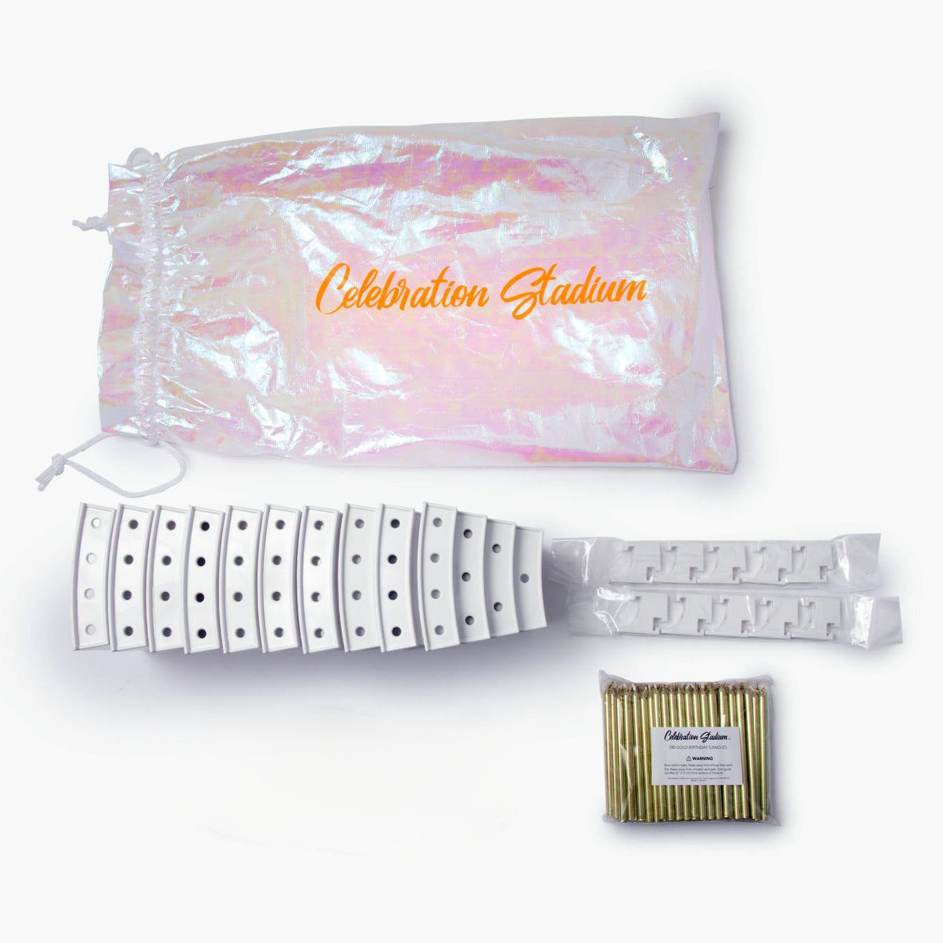 Contents of the Birthday Candle Grandstand: Storage bag, 10 candle stands each with holes for ten candles, ten connector clips for holding single candles, 100 extra-length gold birthday candles