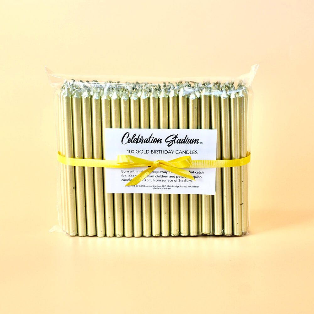 Package of 100 gold birthday candles, included with Candelabra