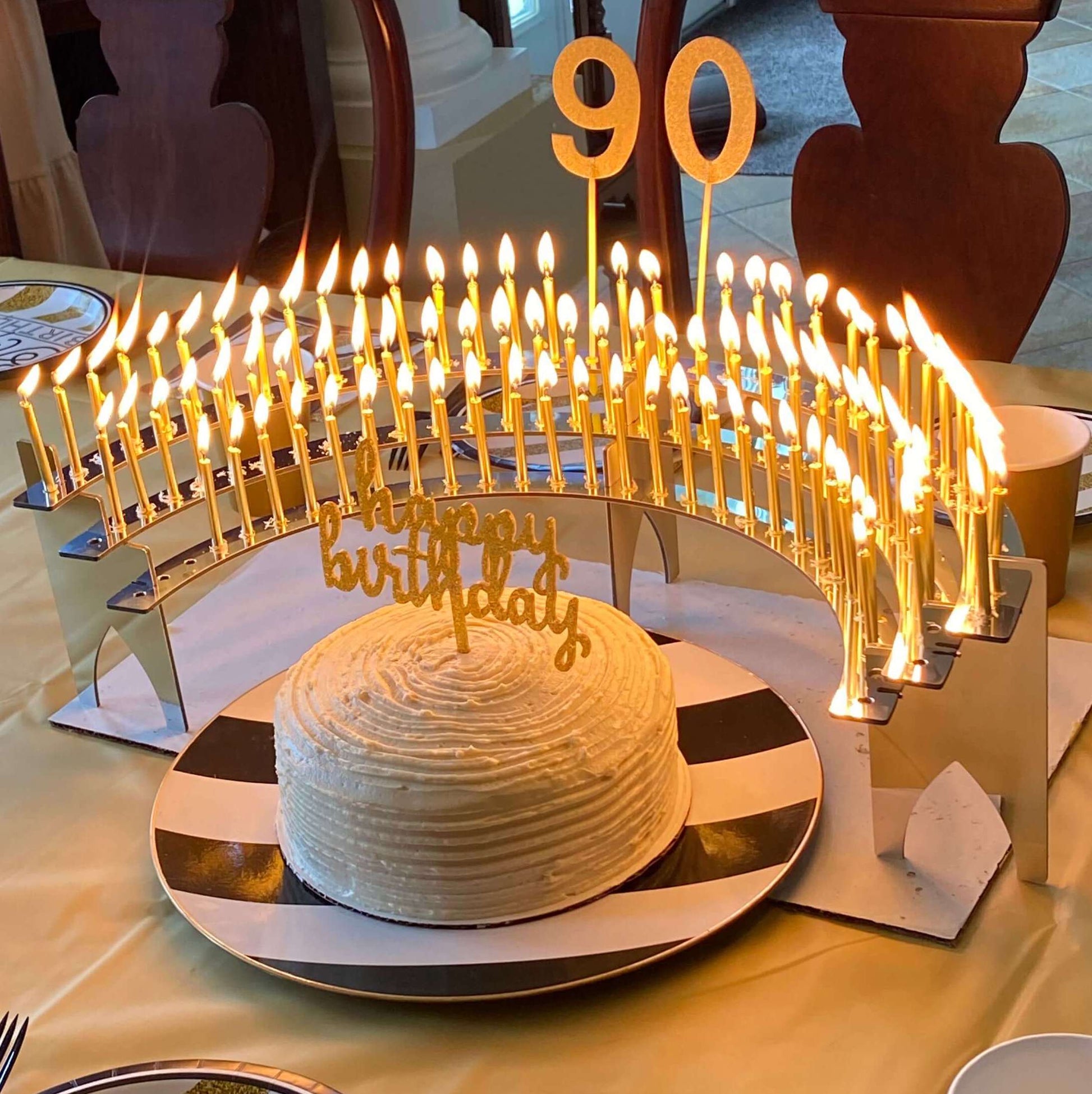 90th Birthday Ideas with Celebration Stadium Birthday Candle Holder, larger-size, mirror-finish.  Customer photo.