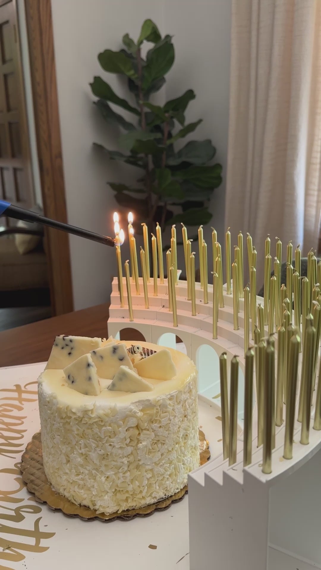 Carrying in a birthday cake with 70 lit candles on a Grand Entrance Tray and Celebration Stadium Candle Holder, get ready to sing "Happy Birthday"!